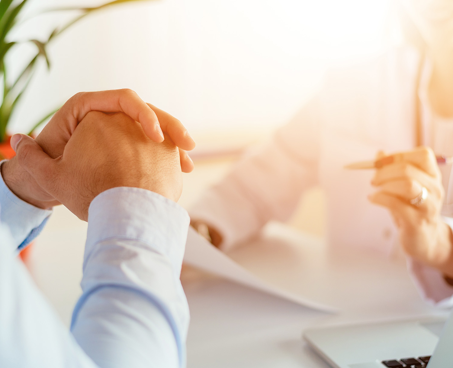 Person talking to consultant. 